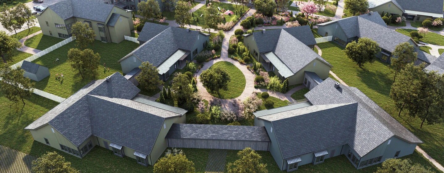 3d rendering of a two story house community with multiple buildings arranged around a central green courtyard, providing an aerial view two story house 3d rendering.